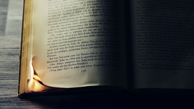 Burning antique book