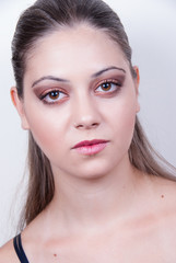 Fototapeta premium Portrait of young lady with nice skin and make up