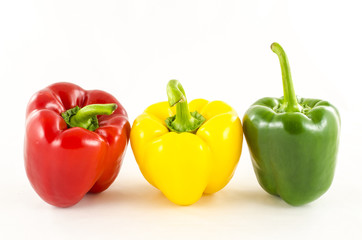 Fresh colorful paprika on white
