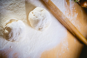 Fototapeta na wymiar tangle of dough with flour, bake bread