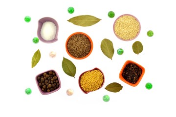 Various kinds of spices in tiny cups