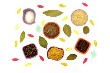 Various kinds of spices in tiny cups