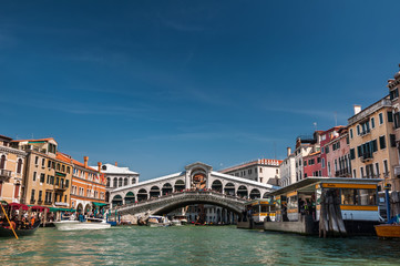 Rialto bridge and boats on Grand Canal, Venice, Italy