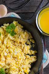 eating healthy breakfast,scrambled egg with wholegrain toast and