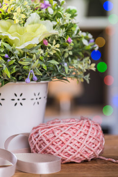 Ball of knitting yarn with flowers