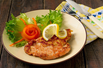 Schnitzel of pork with vegetables