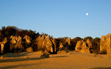 The moon rises over pinnacles, Namung National Park, Western Australia