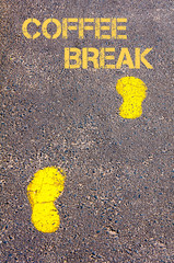 Yellow footsteps on sidewalk towards Coffee Break message