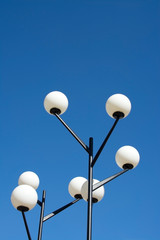 Round fifties lamps with white glass globes Vallingby, Sweden.