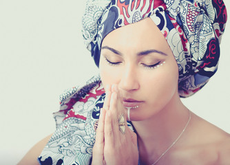 Portrait of a praying girl