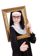 Fototapeta premium Young nun with frame isolated on white