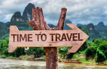 Time to Travel wooden sign with forest background