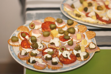 Homemade canape sandwiches for a party. Selective focus.