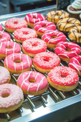 Sweet donuts arranged at display