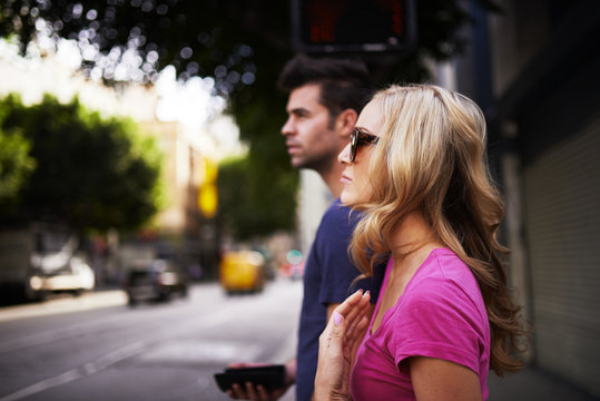 woman with her boyfriend walking in down town los angeles