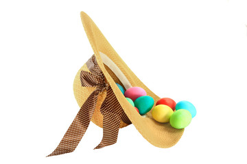 Easter dyed eggs in spring fashioned woman hat
