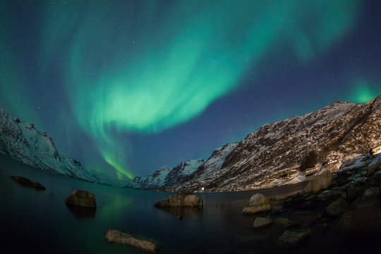 Incredible Aurora Borealis over night sky in Arctic