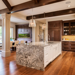 Beautiful kitchen with island in new luxury home