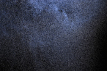 spray from the atomizer spray on black background overlay
