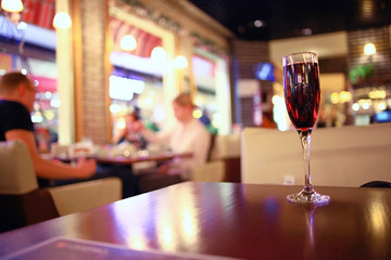 glass of wine restaurant interior serving dinner