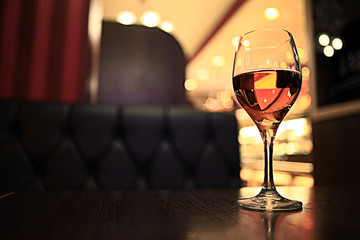 glass of wine restaurant interior serving dinner