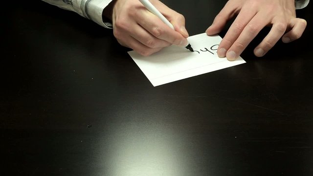 Hands draw the words Shut Up