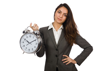 Businesswoman with clock missing her deadlines