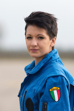 Young woman airplane pilot with uniform portrait.