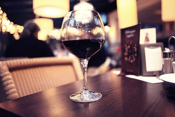 glass of wine restaurant interior serving dinner