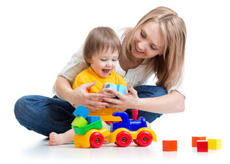 kid with his mom play building blocks toys