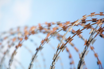 barbed tape cutter against blue sky