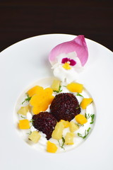 Thai dessert of black sticky rice and mango with coconut cream