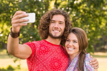 Friends taking a selfie in the park