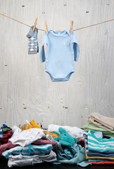 Baby clothes hanging on the clothesline.