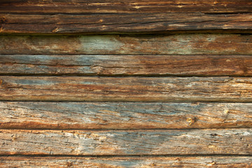 Wooden wall of the old log house