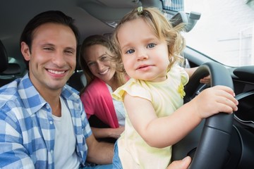 Parents and baby on a drive