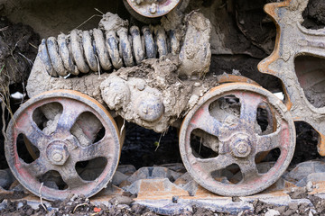 Road wheels of the continuous tracks. Close up.