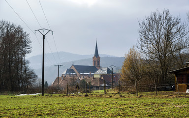 Fototapeta na wymiar Old countryside church in Breitenbach, Alsace