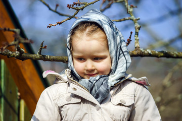 Cute little girl portrait , spring day, playground