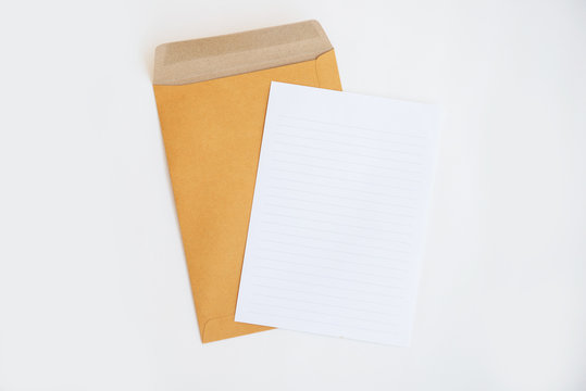 brown envelope and paper note isolate on white background