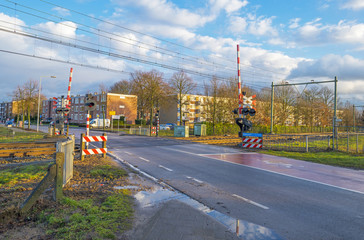 Rail crossing in a city in winter