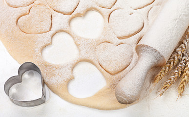 Fototapeta na wymiar Easter concept flour dough heart and ears