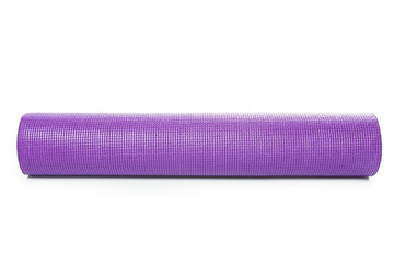 Close up purple yoga mat for exercise isolated