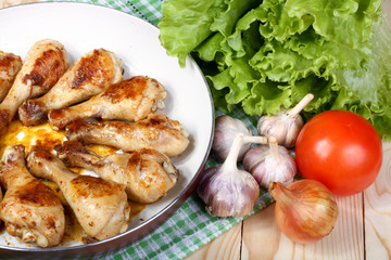 lunch fried chicken legs and vegetables