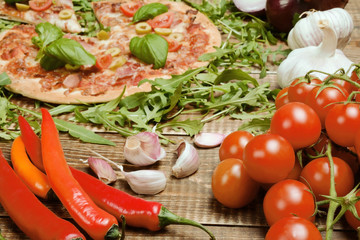 Delicious italian pizza served on wooden table.