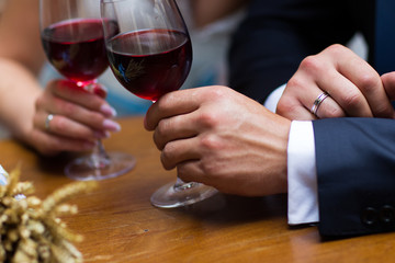 Celebration. People holding glasses of wine