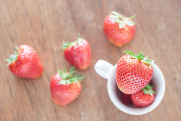 Fresh strawberries on wooden table