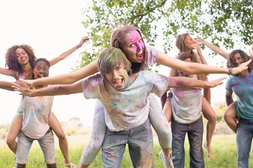 Fototapeta premium Happy friends covered in powder paint