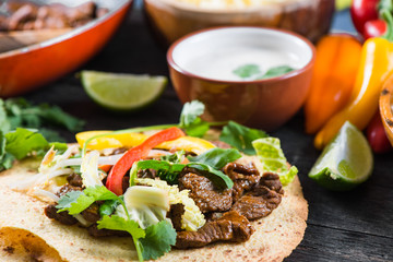 close view on mexina tacos with beef and vegetables