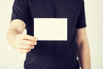 man hand with blank paper